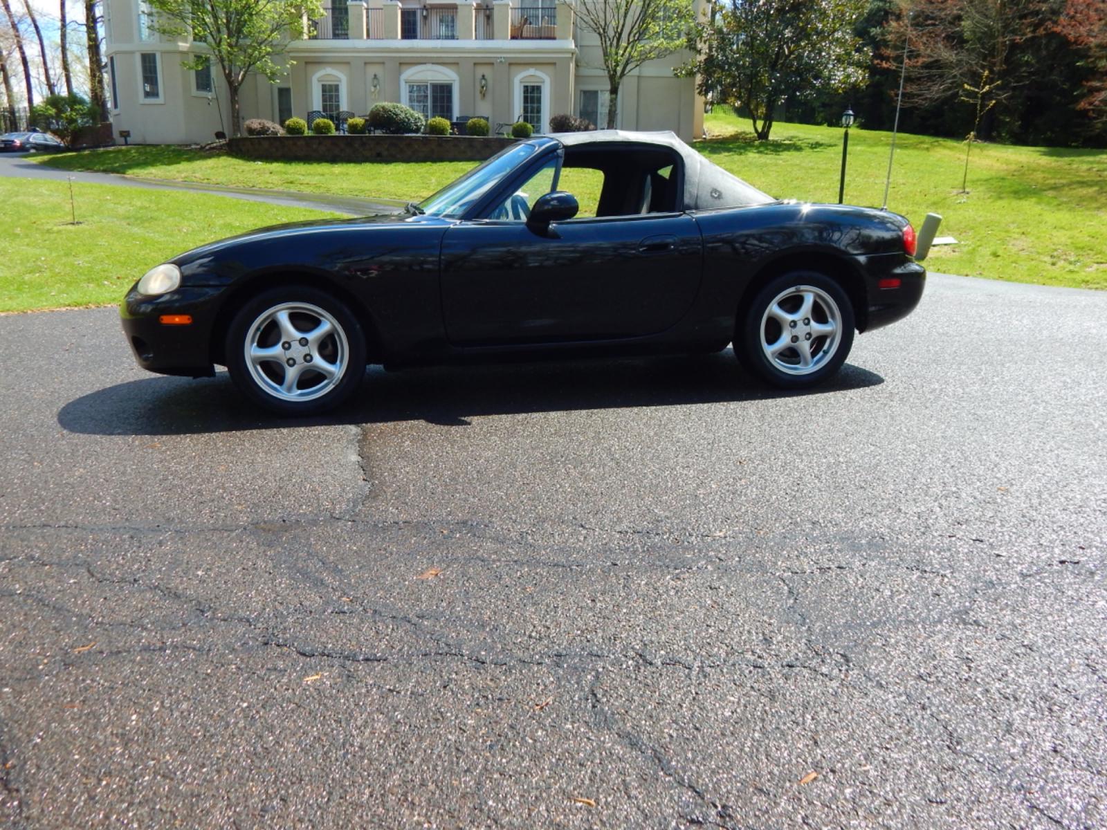 2002 Black /Black Cloth Mazda MX-5 Miata base (JM1NB353920) with an 1.8 liter 4 cylinder engine, 5 speed manual transmission, located at 6528 Lower York Road, New Hope, PA, 18938, (215) 862-9555, 40.358707, -74.977882 - Here for sale is a very fun 2002 Mazda MX-5 Miata. Under the hood is a strong running 1.8 liter 4 cylinder which puts power to the rear wheels via a solid shifting 5 speed manual transmission. Features include; Black cloth interior, wood grain trim, cold AC, power windows, AM/FM/CD, heated rear wi - Photo #1